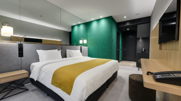 A room comprises of 1 king size bed, mini fridge, Coffee/tea maker, 43” LCD TV, walk-in shower, complimentary WIFI, abundant USB ports, phone and contemporary amenities.